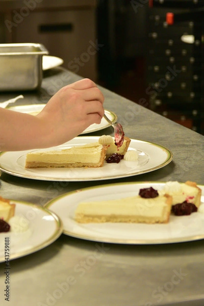 Obraz chef preparing food in the kitchen
