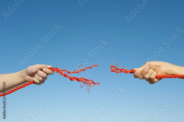 Obraz Hands broken rope sky background