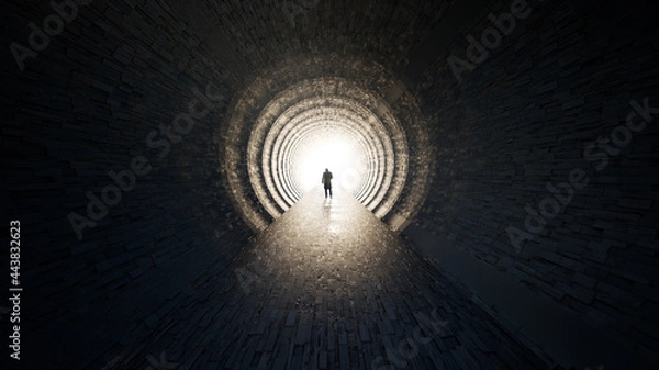 Fototapeta Concept or conceptual dark tunnel with a bright light at the end or exit as metaphor to success, faith, future or hope, a black silhouette of walking man to new opportunity or freedom 3d illustration