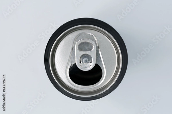 Fototapeta Detail shot from above of the spout of an aluminum can on a white background and selective focus.