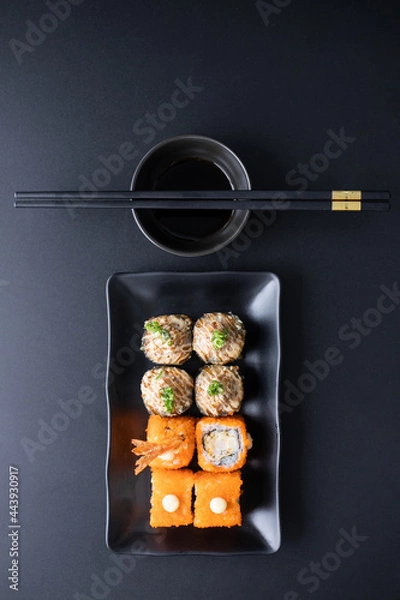 Fototapeta sushi with chopsticks