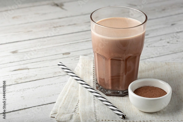 Obraz Glass with chocolate on the table.