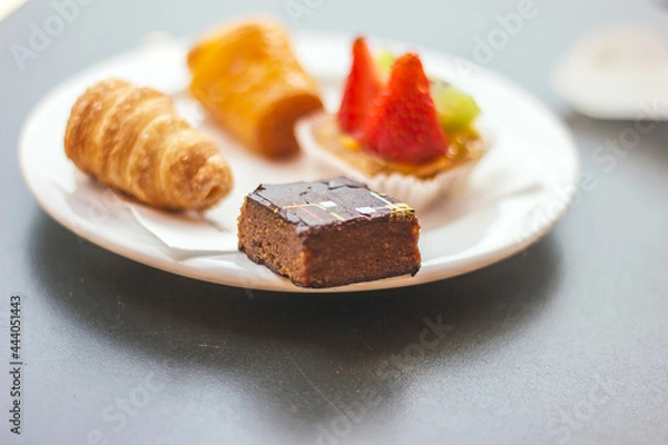 Fototapeta Pastries, custard and chocolate desserts
