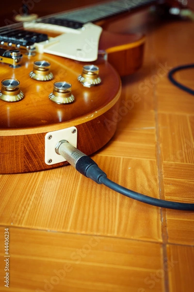 Obraz electric guitar on floor with cable