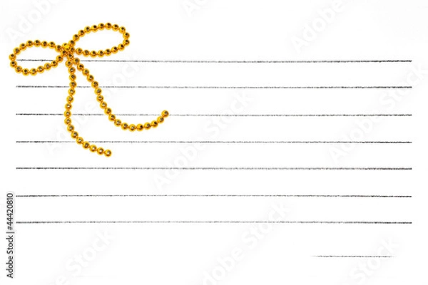 Obraz Gold bow on notepaper
