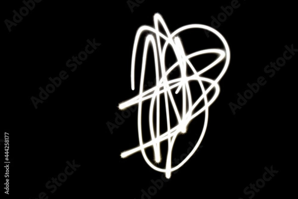 Fototapeta flames on black background. candle light on a dark background.