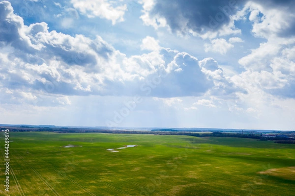 Fototapeta Aerial view of agricultural landscape with fields in spring season.