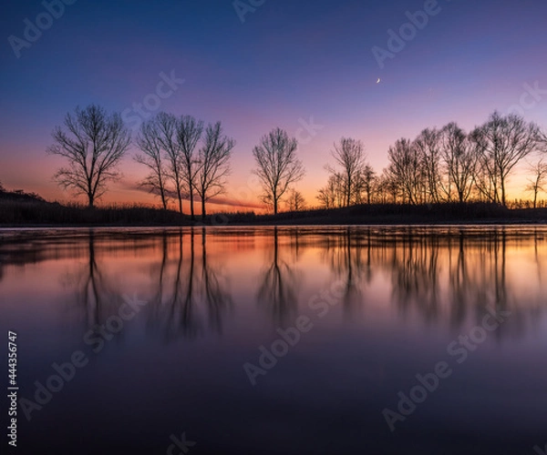 Fototapeta sunset over lake