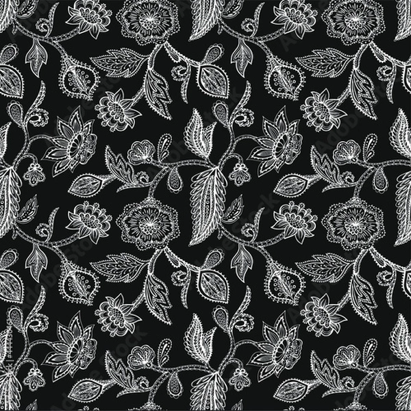 Obraz Vector seamless pattern with line drawn stylized leaves and flowers of exotic plants. Ethnic colorful doodle texture. Mehndi design.  Curved doodling background