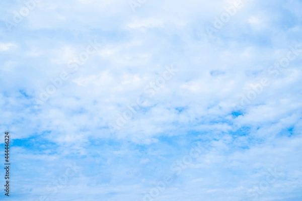 Obraz Blue sky background with clouds.