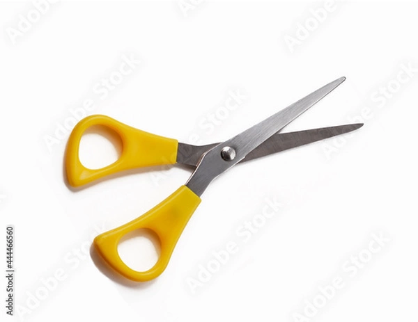 Fototapeta yellow scissor isolated on white backgroumd.