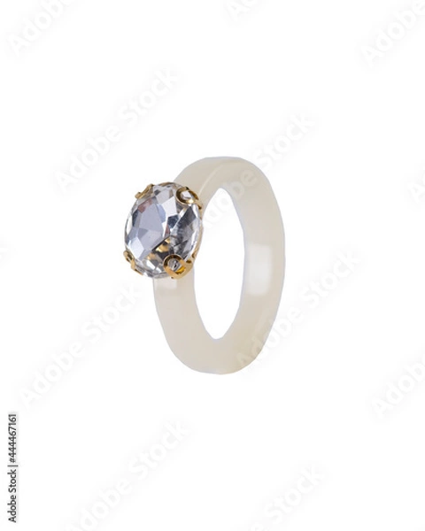 Fototapeta beige plastic ring with crystal