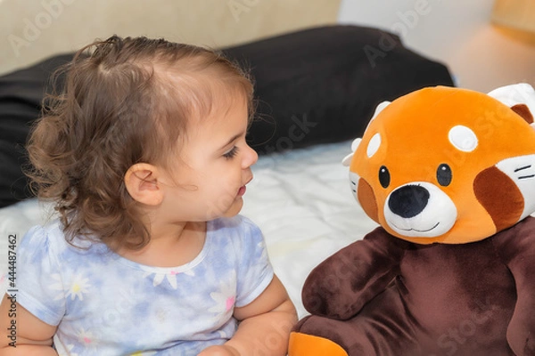 Obraz child playing with toy