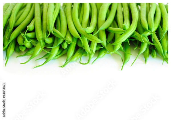 Obraz Green Beans Pile on White Backgrounds