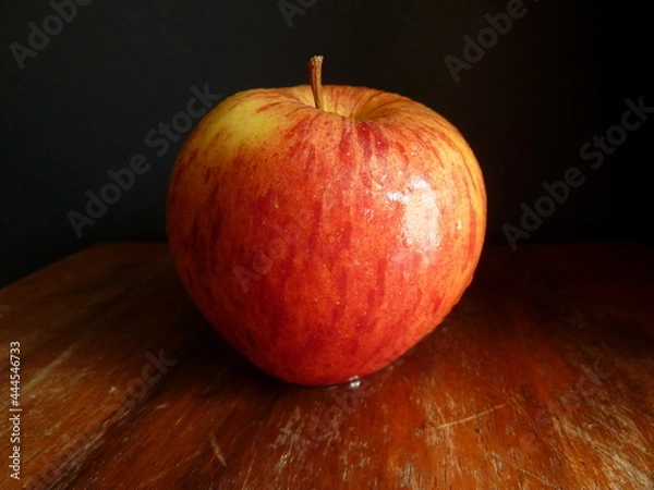 Obraz isolated one and only red apple on black background