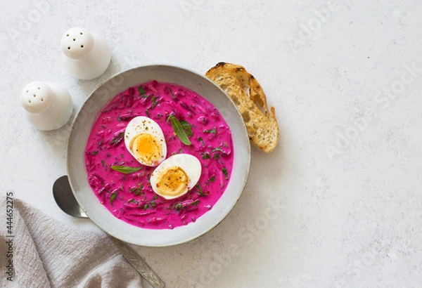 Obraz Cold beetroot cucumber egg soup in a bowl close up