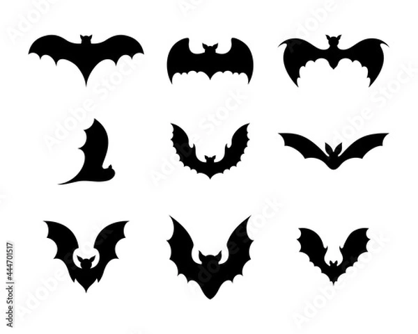 Fototapeta Set of black silhouettes of bats. Creepy decoration of horror design for Halloween party. Spooky background for october night party and invitations. Flat vector stock illustration.