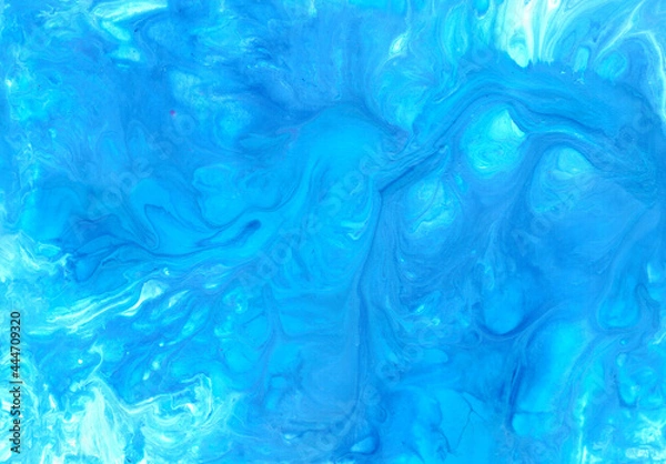 Fototapeta Abstract fluid art background. Blue, purple and white colors mix together. Beautiful creative print. Abstract art hand paint. Original artwork. Color splashing on paper. Interior picture. 