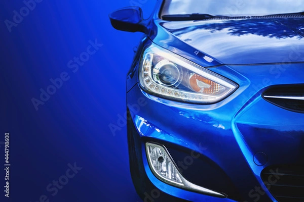 Fototapeta Car headlight. Lamp of modern car headlight. Close up view with copy space.