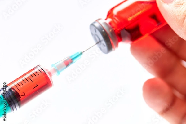 Fototapeta  Vaccine in vial with syringe