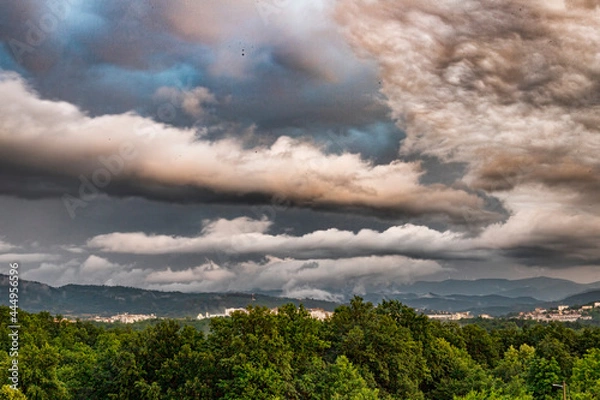 Obraz Clouds above the city 
