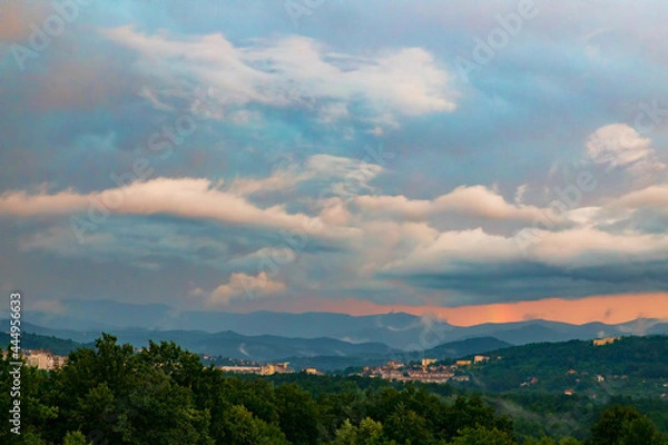 Obraz Clouds above the city 
