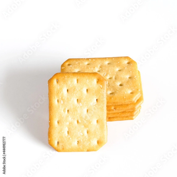 Fototapeta Dry cracker cookies or biscuits on background, concept of food.