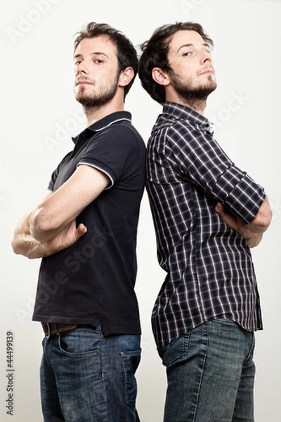 Obraz Two Confident Twins with Arms Folded