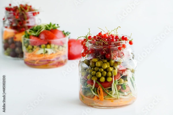 Obraz A snack of raw vegetables in a glass. Vegetarian snack options on the go