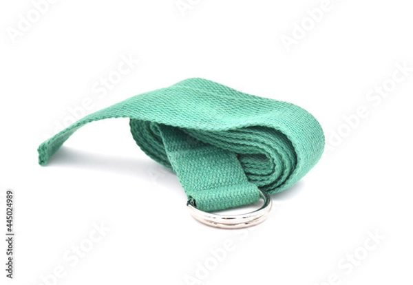 Fototapeta Cork yoga block and green strap isolated on a white background