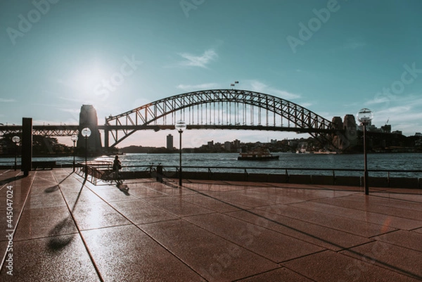 Fototapeta "Sydney, NSW / Australia - April 17, 2020: Sydney Opera House and Circular Quay surroundings completely isolated and with social distancing under lockdown due to Coronavirus outbreak"