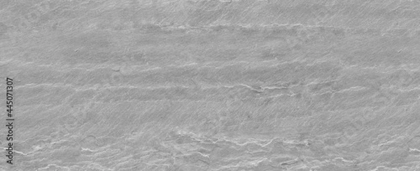 Fototapeta Panorama gray grunge banner. Abstract stone background. The texture of the stone wall. Close-up. Light gray rock backdrop