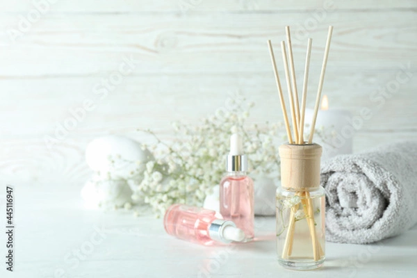 Fototapeta Aromatic concept with diffuser on white wooden table