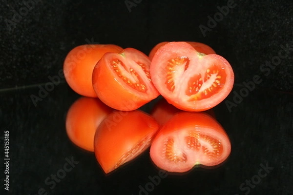 Obraz tomato on a black background