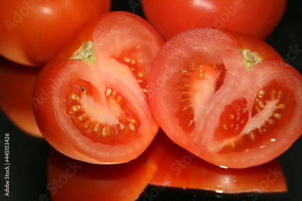 Obraz tomatoes on a cutting board
