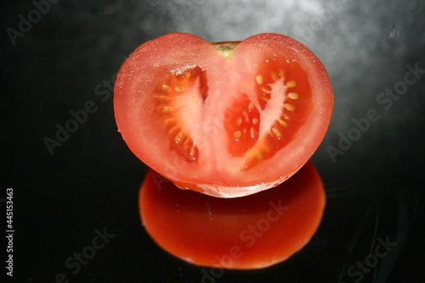 Obraz tomato on black background
