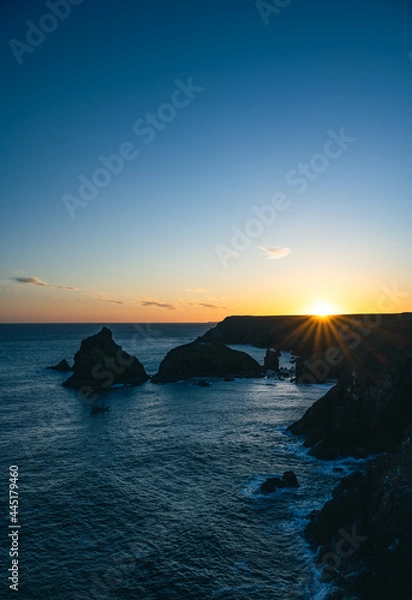Obraz sunset over the sea at Kynance cove , Cornwall ,U.K 