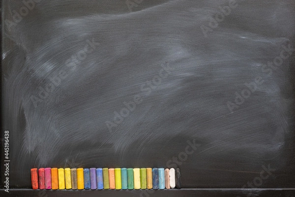 Obraz Blackboard with colored chalks