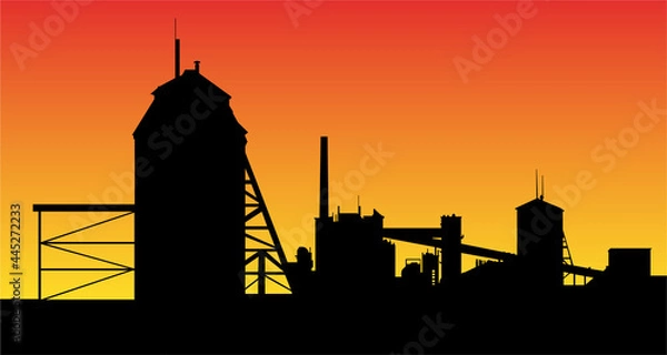Fototapeta Oil shale processing plant silhouette on background of sunset. Technical buildings and conveyor belt.