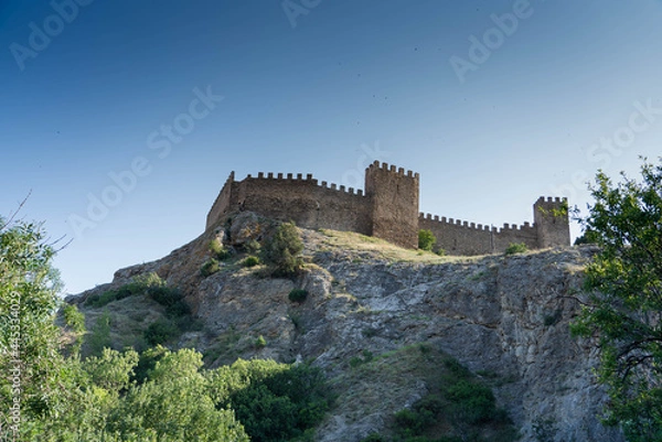 Obraz During the day, on the rock there is a fortress from the Middle Ages, the Genoese fortress