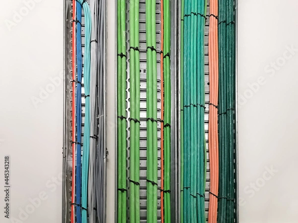 Obraz Detailed view of a cable tray in metallic mat, of a technical installation, with CCTV, telecommunications and electricity