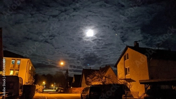 Obraz Mond hinter Wolken