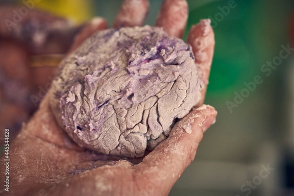 Obraz Sweat colorful dough with berries in hand of Chief