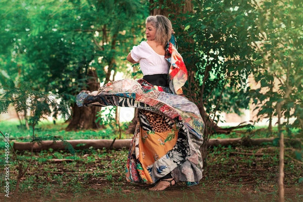 Obraz gypsy woman background trees.