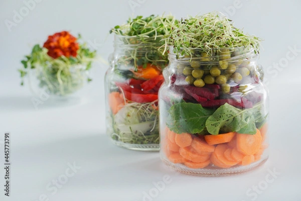 Obraz A snack of raw vegetables in a glass. Vegetarian snack options on the go