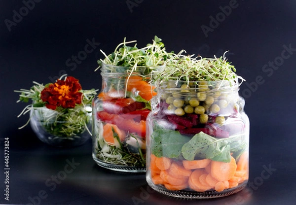 Obraz A snack of raw vegetables in a glass. Vegetarian snack options on the go