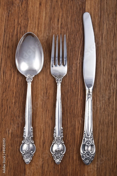 Fototapeta Retro cutlery set on wooden background