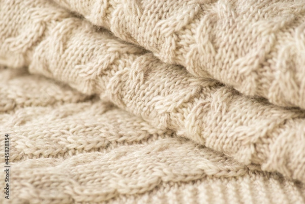 Fototapeta Closeup photo of knitted woolen fabric with pattern