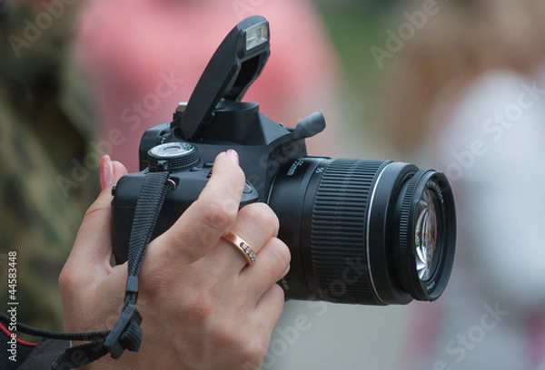 Obraz Camera in a female hand
