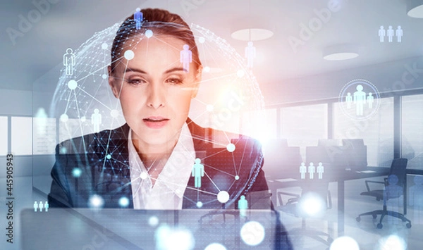 Fototapeta Front view portrait of attractive recruiter woman who is looking for new employees for the international project. Social media people icons and worldwide recruitment process.